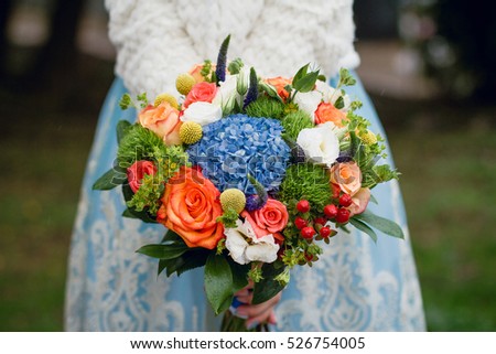 Beautiful summer wedding bouquet. Delicate bright flowers for girls