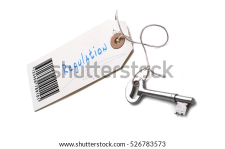 A silver key with a tag attached with a Regulation concept written on it.