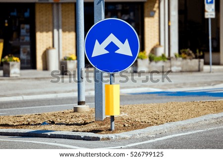 Road sign with two way left and on the right