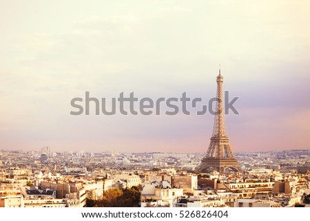 Sunset Eiffel tower and Paris city view form Triumph Arc. Eiffel Tower from Champ de Mars, Paris, France. Beautiful Romantic background.