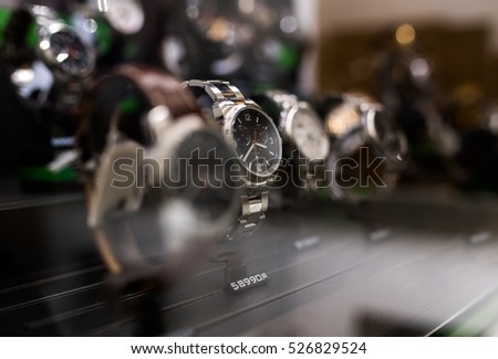 Watches in a luxury store Royalty-Free Stock Photo #526829524