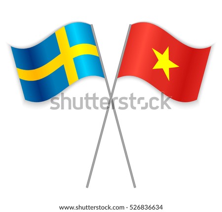Swedish and Vietnamese crossed flags. Sweden combined with Vietnam isolated on white. Language learning, international business or travel concept.