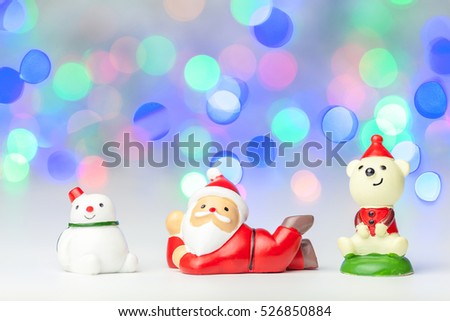 Santa claus and snowman with  bokeh background