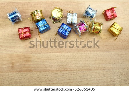 New Year Christmas background with decorations and gift boxes on wooden background, copy space for text and logo