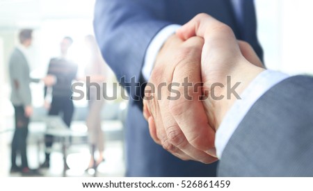Closeup of a business handshake Royalty-Free Stock Photo #526861459