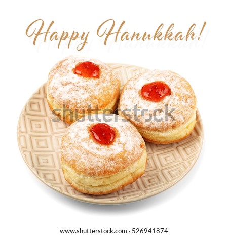 Plate with tasty donuts on white background. Hanukkah celebration concept. Text HAPPY HANUKKAH