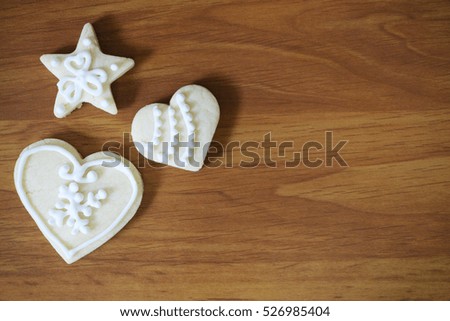 Christmas gingerbread cookies on wooden table with copy space , vignetting effect image