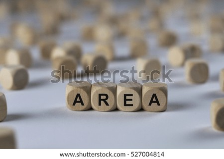 area - cube with letters, sign with wooden cubes