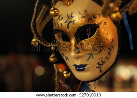 Venice Carnival, typical mask of this event Royalty-Free Stock Photo #527010010