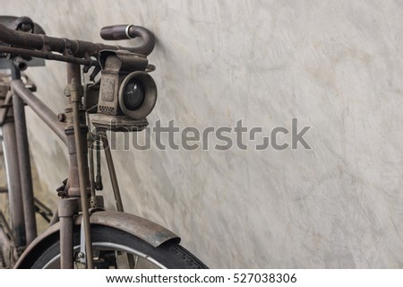 Bike,Bicycle vintage style near the concrete wall.