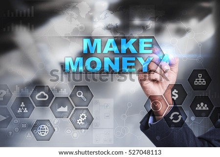 Businessman is drawing on virtual screen. make money concept.