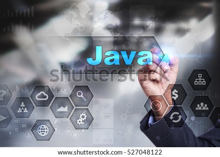 Businessman is drawing on virtual screen. java concept.