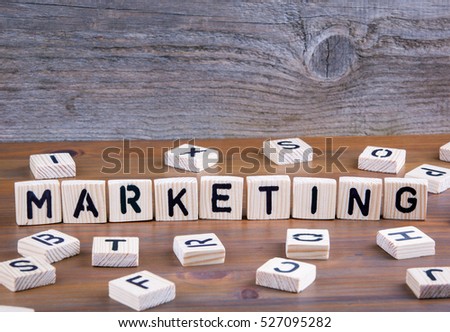 Marketing from wooden letters on wooden background