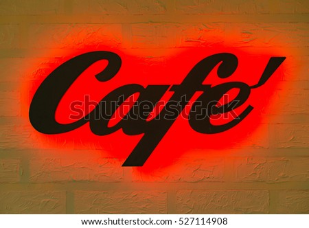 Electric Cafe logo,Black letters light red background.
