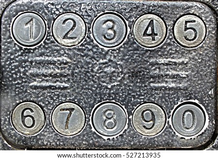 Metall numbers buttons texture Royalty-Free Stock Photo #527213935