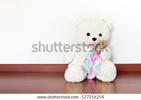 Family Teddy Bear on wooden floor