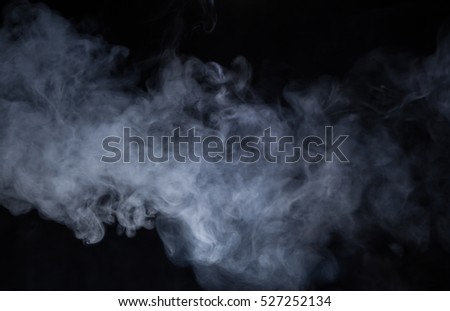 smoke on blackbackground Royalty-Free Stock Photo #527252134