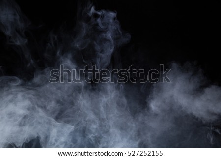 smoke on blackbackground Royalty-Free Stock Photo #527252155
