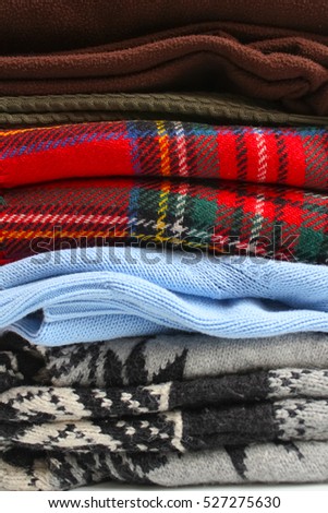 stack of warm and cozy wool sweaters