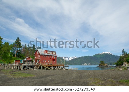 red wooden house on the bay, Halibut Cove , Alaska