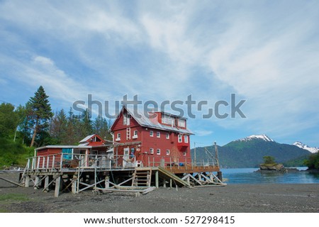 red wooden house on the bay , Halibut Cove, Alaska