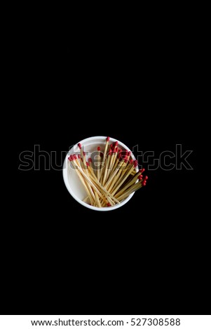 matchsticks on a black background, place for text. Matchsticks art. Group of red wooden matches. barbecue concept. Pile of matchsticks. group concept style. teamwork concept, group of company concept.