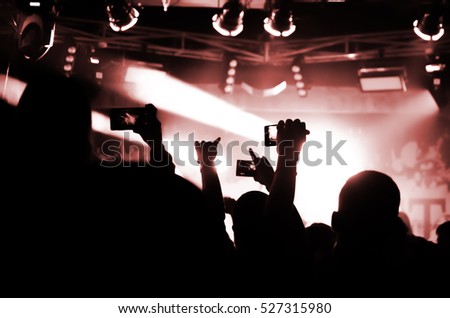 Capture video at a concert at the camera in a bright spotlight lamps