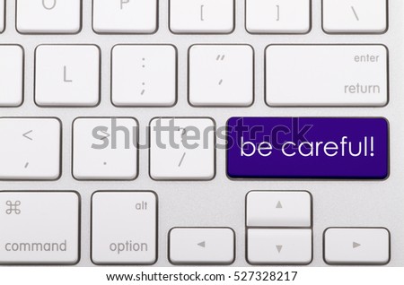 Be careful word written on computer keyboard.