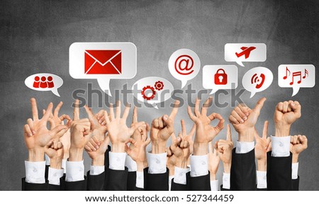 Many hands of businesspeople showing different gestures