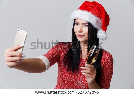 Girl in Christmas makes selfie