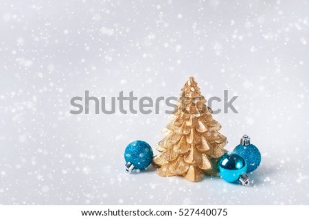 Christmas golden tree and balls on white background
