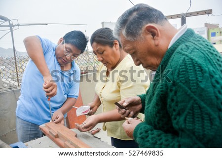 Latin people working with wood