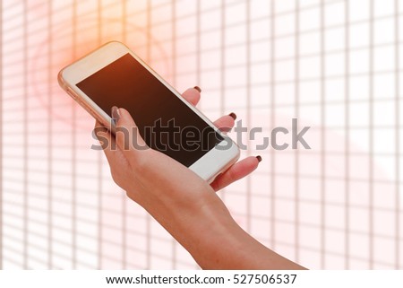 close up hand using phone black screen