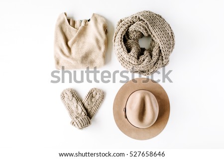 beauty feminine clothes arrangement with hat, mittens, sweater, scarf. flat lay, top view