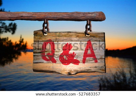 Questions and answers motivational phrase sign on old wood with blurred background Royalty-Free Stock Photo #527683357