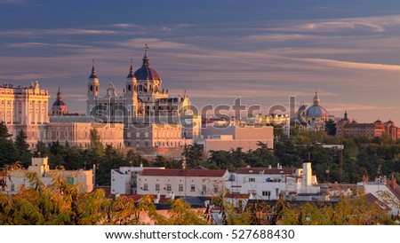 Madrid. Panoramic image of Madrid skyline with Santa Maria la Real de La Almudena Cathedral and the Royal Palace during sunset.