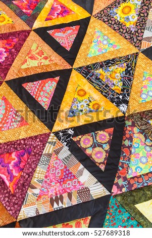 Patchwork quilt. Part of patchwork quilt as background. Handmade. Colorful blanket.