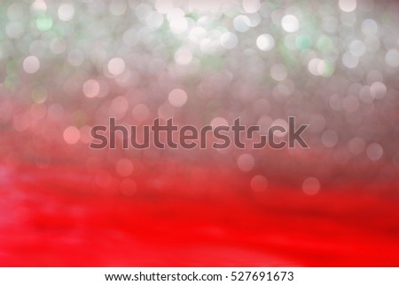 Abstract bokeh picture silver and red color of Christmas decoration for background, greeting cards, happiness festival, New years wishes sent to everyone you love