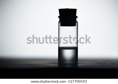 bottle with clear liquid