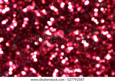 Bright and abstract blurred violet background with shimmering glitter