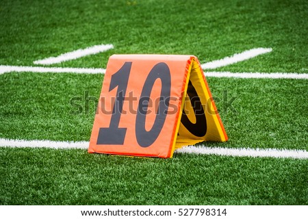 Picture of football 10 yard line number marker