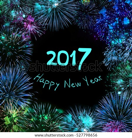 Greeting card With text Happy new year 2017 and various colorful fireworks on black background. Multicolored Frame. Web banner square image Royalty-Free Stock Photo #527798656