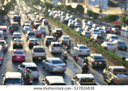 Aerial blurred image of traffic  in Bangkok, Thailand. High-occupancy vehicle lane used at peak travel times. Urban infrastructure problem. Royalty-Free Stock Photo #527826838