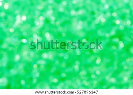 Abstract bokeh picture from ice  green color for background, greeting cards, happiness festival, New years wishes sent to everyone you love