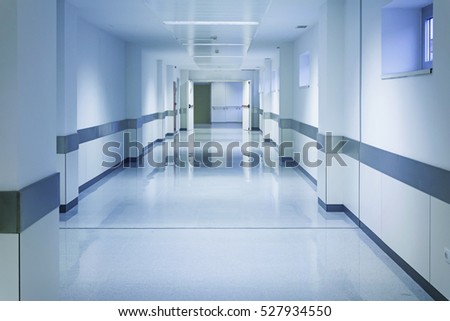 Empty hospital hall with white walls, medicine Royalty-Free Stock Photo #527934550