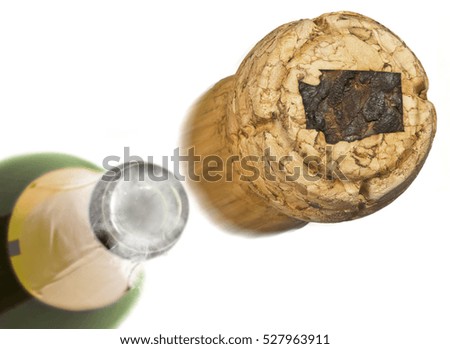 Champagne cork with the shape of Washington burnt in and bottle of champagne in the back.(series)