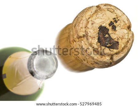 Champagne cork with the shape of Northwest Territories burnt in and bottle of champagne in the back.(series)