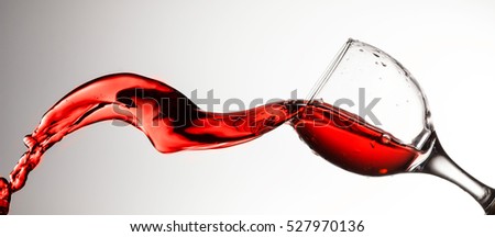 Red wine splash on the white background