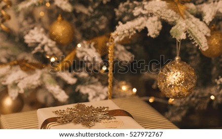 Golden christmas tree decoration. Holidays background. Vintage style toned picture