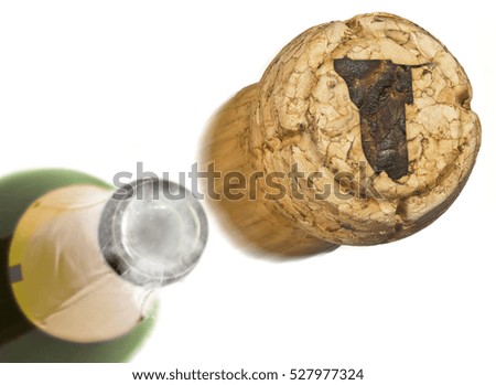 Champagne cork with the shape of Namibia burnt in and bottle of champagne in the back.(series)